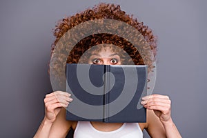 Close up photo of beautiful foxy lady book reader hide facial emotions shy person wear white tank-top isolated grey