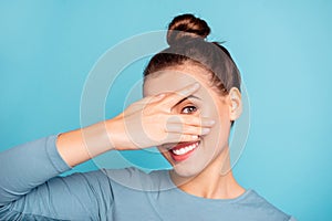 Close up photo beautiful she her lady arm hand fingers raised hide half face toothy beaming smile cute nice-looking