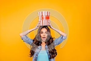 Close up photo beautiful her she lady hold big large popcorn box on head stupor oh no expression change channel wear