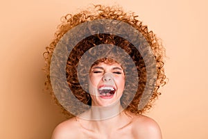 Close up photo beautiful she her no clothes nude lady laughing out loud eyes closed listening jokes funny funky curls