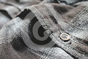 close up photo of black shirt with square patter