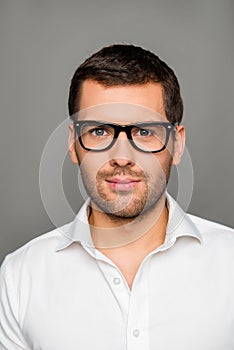 Close up photo of brainy smiling man