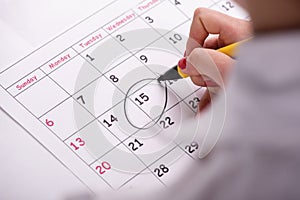 Close-up photo of calendar with a datum circled