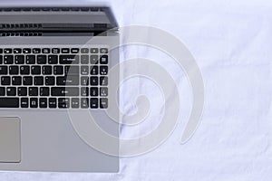 Isolated close-up Top View of Laptop Keyboard on White Background