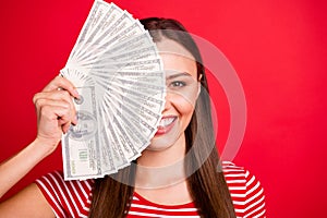 Close up photo of charming beautiful cute nice amazing girl hiding behind her cash while wearing striped t-shirt