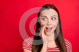 Close up photo of cheerful excited trendy funny funky girlfriend announcing something new while isolated over red