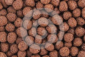 Close up photo of chocolate corn balls. Top view high resolution macro photo