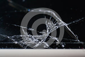 close-up photo of a cracked screen of a phone