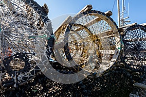 Close up photo of different crab traps on land, in the small fishing village Lista, Norway photo