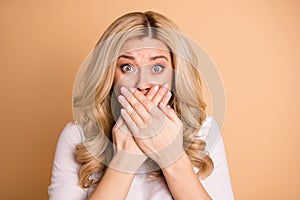 Close up photo of frustrate lady hide face palms astonished isolated beige background