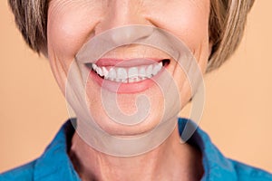 Close up photo of good mood senior woman with bob hairstyle toothy smiling demonstrate healty teeth isolated on pastel