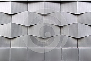 Close-up photo of the gray modern building facade, architecture geometric pattern