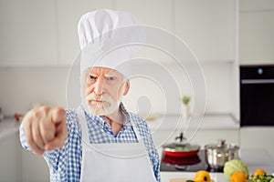 Close up photo grey haired he his him grandpa arm hand finger it is your fault my dish spoiled rage face wear baker