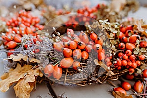 Close up photo of handmade colorful floral autumn door wreath