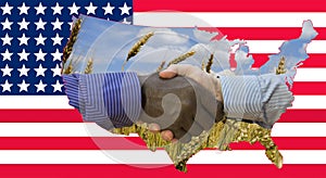 Close up photo of a handshake between afroamerican and european hands. Handshake in front of US flag. On the flag are the contours