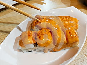 Close-up photo of the Indonesian version of Japanese food, crispy menta tuna salad. photo