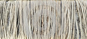 a close up photo of jute fiber Closeup shot, raw jute fiber hanging under the sun for natural drying