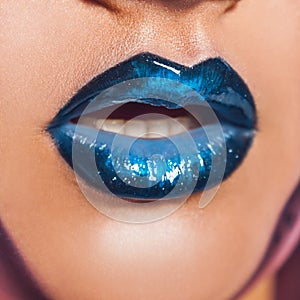 Close up photo of lips with blue lipstick