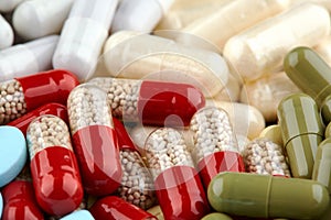 Close-up photo of many colorful pills and capsules