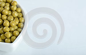 Close up photo of marinated green olives
