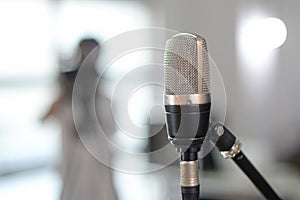 Close-up photo of microphone in recording studio