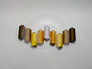 Colorful Spools of Sewing Thread on White Background