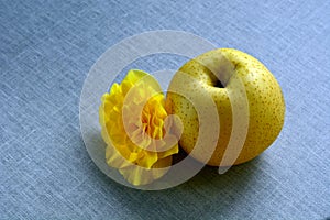 Close up photo of a Nashi Pear, also known as Asian Pear. Pyrus pyrifolia is a species of pear tree native to East Asia.