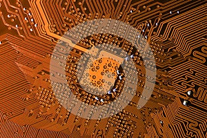 Close up photo of orange pcb printecd circuit board electric paths