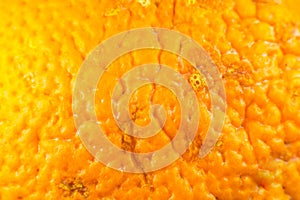 Close up photo of orange peel texture. Oranges ripe fruit background, macro view. .Human skin problem concept, acne and cellulite