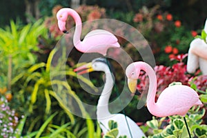 Close-up photo of a pink flamingo statue