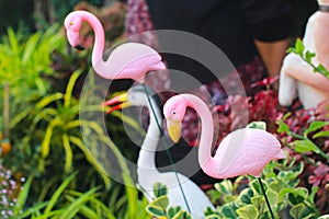 Close-up photo of a pink flamingo statue