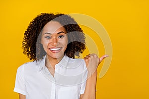 Close up photo of pleased lady arm thumb index offer blank space sale discount shopping banner isolated on yellow color