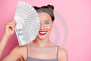 Close up photo of positive girl hold money fan hide half face million dollars she win lottery wear good looking clothing