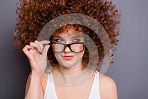 Close up photo of pretty foxy lady look wondered empty space think over tricky action wear specs white tank-top isolated