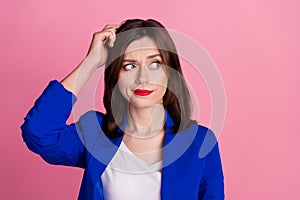Close up photo of pretty intelligent lady wear stylish clothes hand head look empty space hard decision isolated on pink