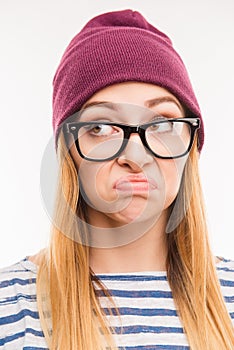 Close up photo of pretty minded girl in hat and glasses
