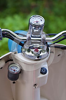 Close-up photo of retro scooter odometer