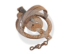 Close up photo of a rusty vermin trap on a white background