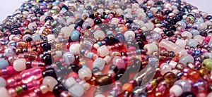close up photo of seed beads in purse