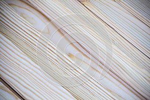 Close up photo of soft weathered hand cut wooden slats kindling at a diagonal for background texture