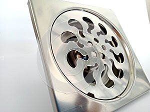 Close-up photo of a stainless steel floor drain