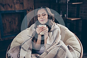 Close up photo sweet beautiful brunette she her lady homey living room eyes closed morning relaxing hot beverage covered