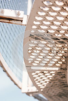 Close-up photo of technological metal grid structure. Abstract  background image on the subject of modern architecture, industry