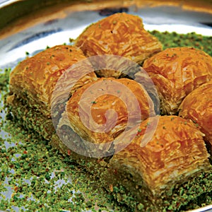 Close up photo of Turkish Gaziantep baklava with pistachio, Turkish cuisine.