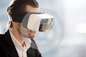 Close up photo of VR headset on mans head