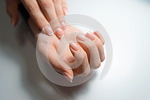 Close up photo of woman hands with beautiful nails, treatment concept