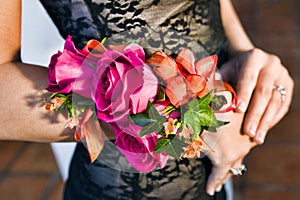 Close up photo of woman in prom with corsage
