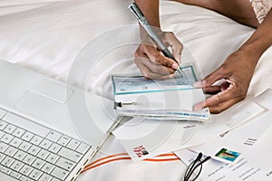 Close up photo of Woman Writing Check