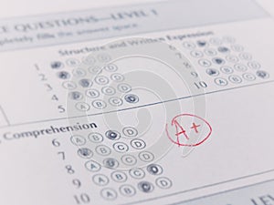 Close-up photograph of a perfect grade on a scantron test photo