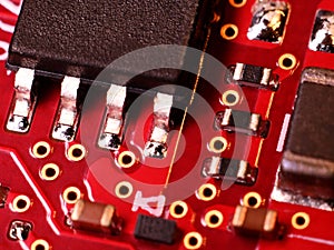 Macro View of Red Printed Circuit Board with Components